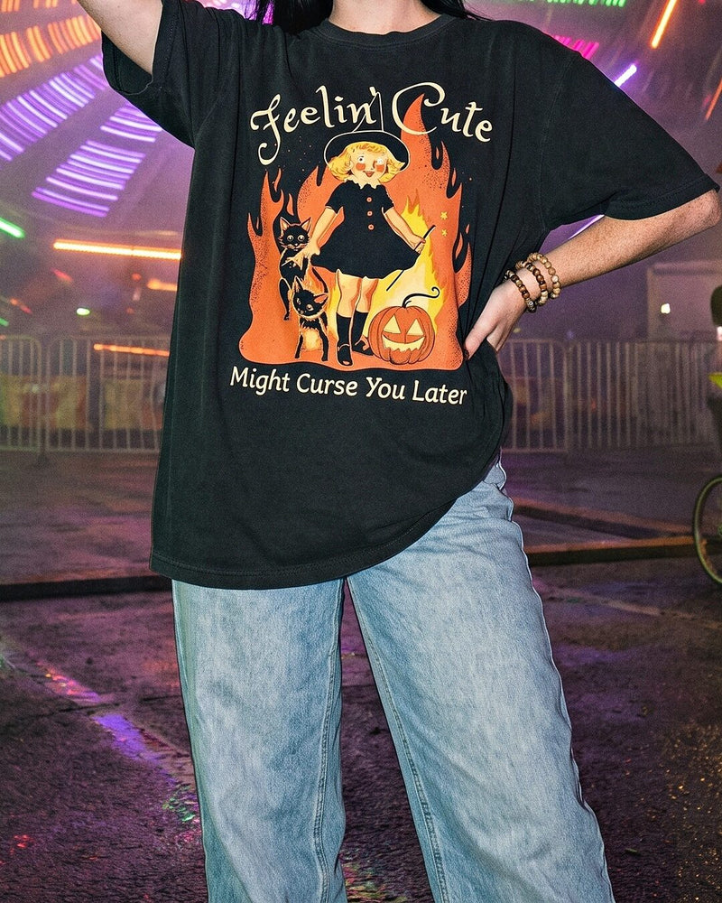 A woman at a carnival at night in a garment-dyed Feelin\