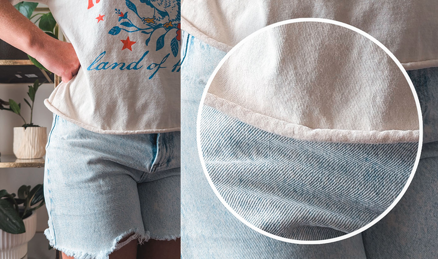 A Lucy Jaynes garment shown custom cropped, with a close-up of the cut hem curling outward.